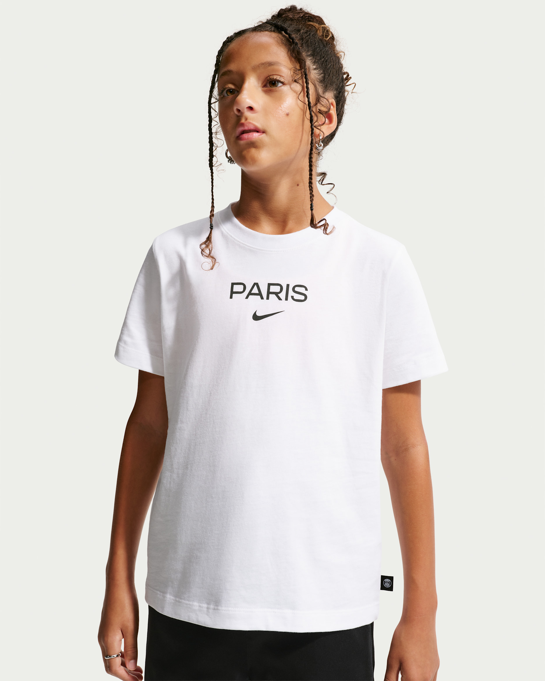 Paris Saint-Germain Older Kids' Nike Football T-shirt. Nike IL
